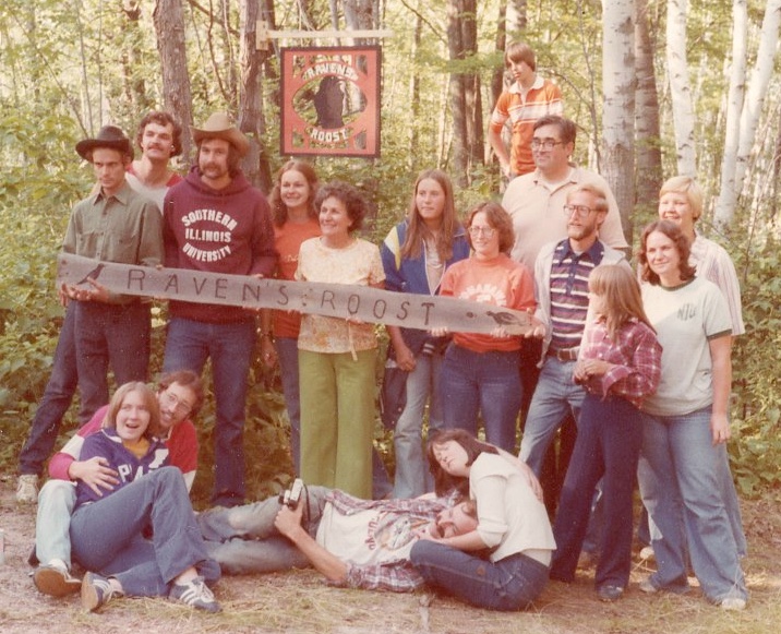Zuiker family holding a Ravens Roost sign